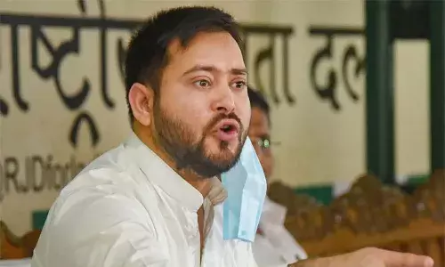 దమ్ముంటే మమ్మల్ని అరెస్ట్‌ చేయండి. లేదంటే నేనే లొంగిపోతాను: తేజస్వీ యాదవ్‌