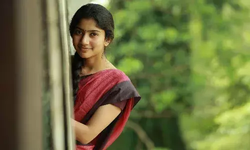 సాయి పల్లవిని ముద్దు సీన్ నుండి కాపాడిన హీరో