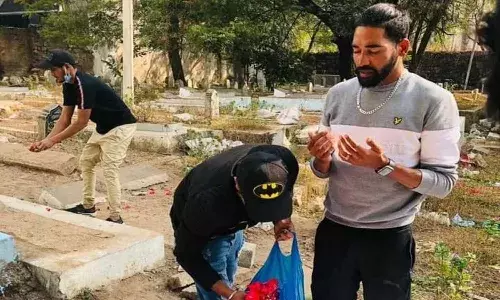 Siraj drives straight from the airport to his fathers grave