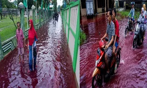 ఇండోనేషియాలోని ఆ గ్రామపు వీధుల్లోకి రక్తపు రంగు వరద నీరు!