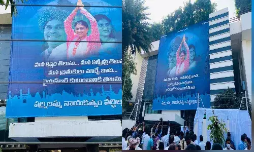 YS Sharmila meeting flexis at lotus pond