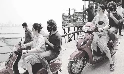 Charmme Kaur ride with Vijay Devarakonda.