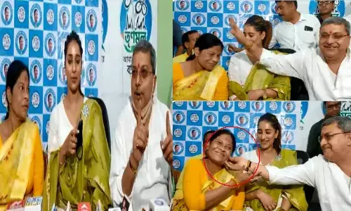 TMC MP pulling cheeks of woman MLA video shared by BJP