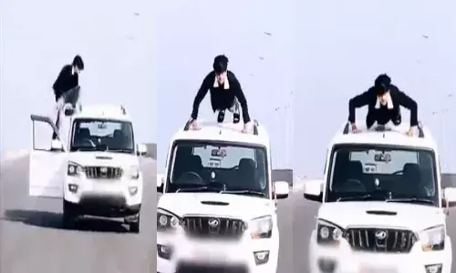 UP Police Take Action Against Man Doing Push ups On Moving Car