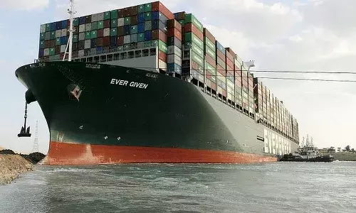 Canal service provider says container ship in Suez set free