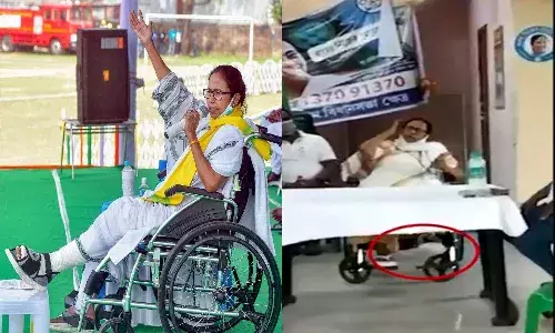 Mamata Banerjee shaking injured  leg