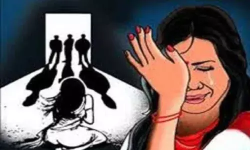 young woman harrased by brothers