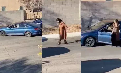 woman struggling to park