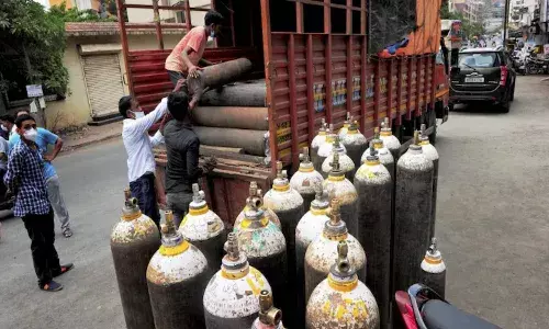 cops rescue covid patients