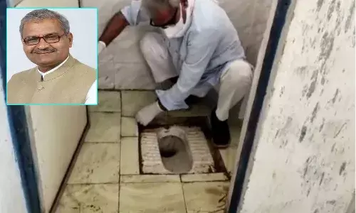 MP Janardan cleans toilets