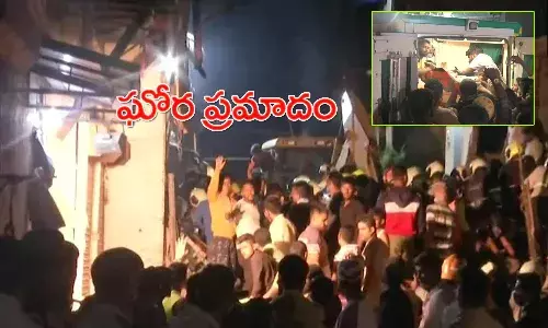 విషాదం.. కుప్పకూలిన నాలుగు అంతస్తుల భవనం.. 9 మంది మృతి