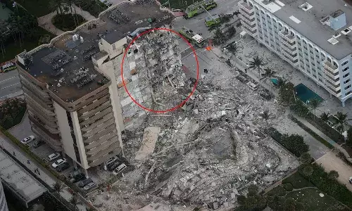 కుప్పకూలిన 12 అంతస్తుల భవనం.. 99 మంది మిస్సింగ్