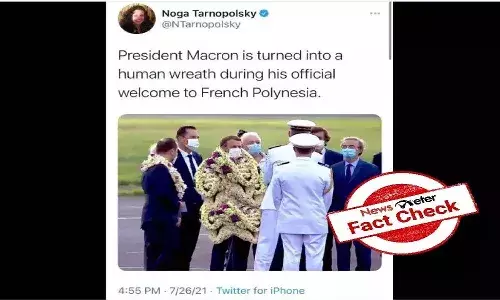 Fact Check : ఫ్రాన్స్ ప్రెసిడెంట్ ను పూలమాలలతో నింపేశారా..?