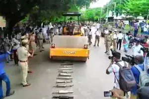 బైక్ సైలెన్సర్లను రోడ్డు రోలర్తో ద్వంసం చేయించిన ఎస్పీ బైక్ సైలెన్సర్లను రోడ్డు రోలర్తో ద్వంసం చేయించిన ఎస్పీ