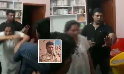 వివాహితతో ఎస్ఐ రాసలీలలు.. రెడ్‌హ్యాండెడ్‌గా పట్టుకుని చితకబాదిన భర్త