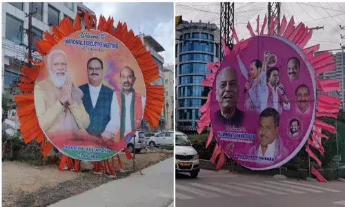 హైదరాబాద్ లో బీజేపీ-టీఆర్ఎస్ హోర్డింగ్ వార్