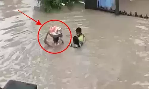 మంథనిలో బహుబలి సీన్ రిపీట్.. పసికందును రక్షించిన పెద్దనాన్న