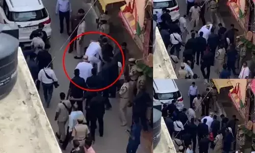 అమిత్ షాకు చెప్పులు అందించిన బండి సంజయ్.. నెటిజన్ల ట్రోలింగ్