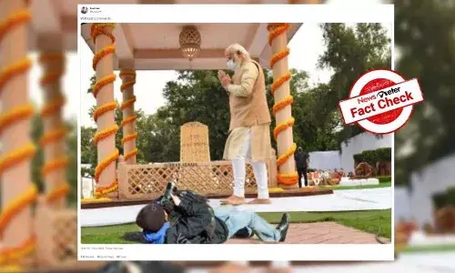 Fact Check: ప్రధాని మోదీ ఫోటో తీయడానికి ఫోటో గ్రాఫర్ కింద పడుకున్నాడా..?