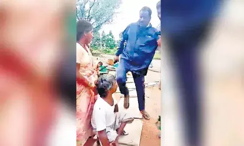 దివ్యాంగుడిపై సర్పంచ్ దాడి.. కాలితో తన్నేందుకు యత్నం