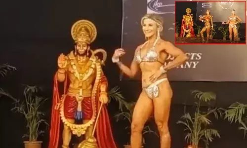 Hanuman idol, bodybuilders