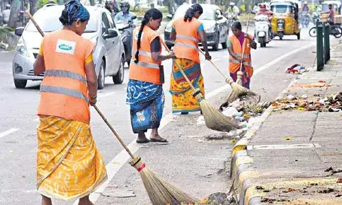 Telangana government, sanitation workers , HMWSSB, GHMC, KCR