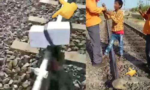 Karnataka, Balasore,  Odisha, Railway track, stones, underage boy