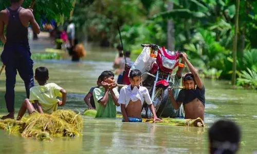 Assam , Assam floods,  Red Alert, IMD , Guwahati