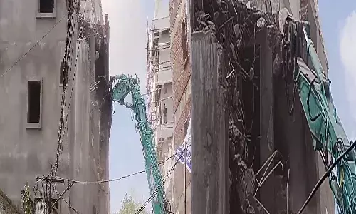 Hyderabad, demolishing,  leaning building, GHMC
