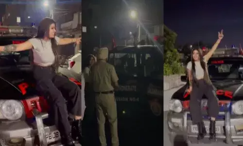 young girl, reels,  police vehicle, suspension, viral video,