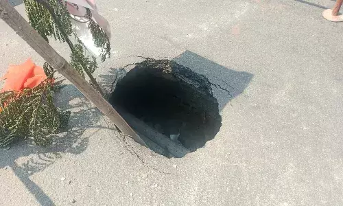 huge pothole,  road,  Chaitanyapuri, hyderabad,