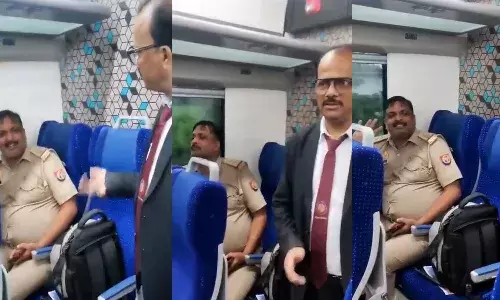 police officer,  vande bharat express, without ticket, viral video,