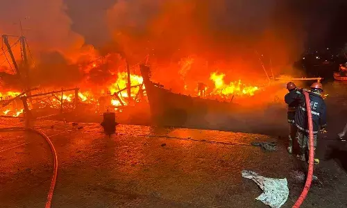 Huge fire, Vizag, fishing harbor, 35 boats, APnews