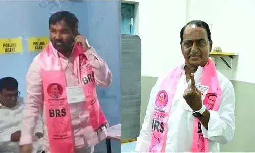 Allola Indra Karan Reddy,  MLA Durgam Chinnaiah, vote, BRS scarf, Telangana Polls
