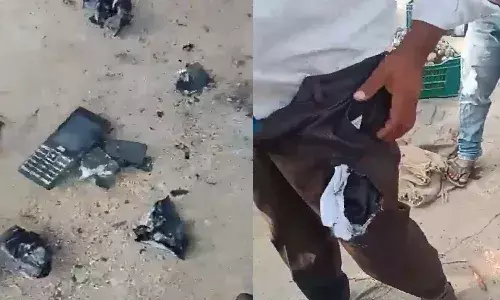 cell phone, blast,  pant pocket, gadwal,