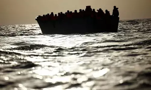 Boat, capsizes off, Libyan coast, 60 dead ,