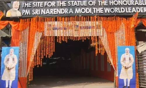 prime minister, narendra modi, bronze statue,  naveen chandra borah,