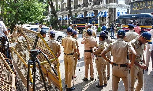 mumbai, bomb warning call, police, alert ,