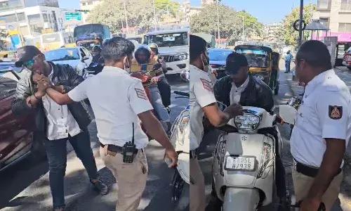 man, bite, traffic constable, hand, viral video,