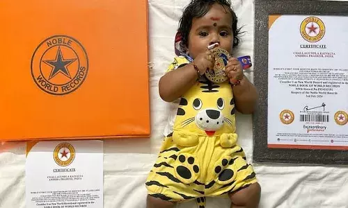four months baby, nobel world record, andhra pradesh,