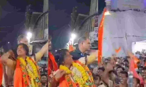 mp asaduddin owaisi , bjp, madhavi latha, shooting arrow , masjid, Hyderabad