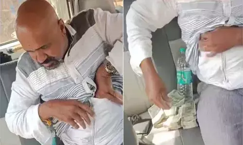 షర్ట్ లో ఎన్ని లక్షలు దాచాడో తెలుసా.?