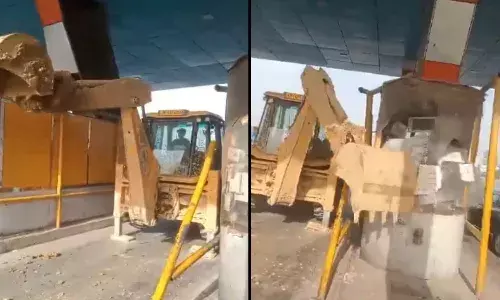 uttar pradesh,  bulldozer driver,  toll plaza ,