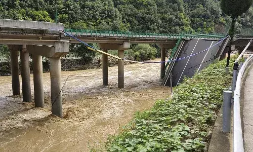 China, bridge collapse, floods, heavy rain