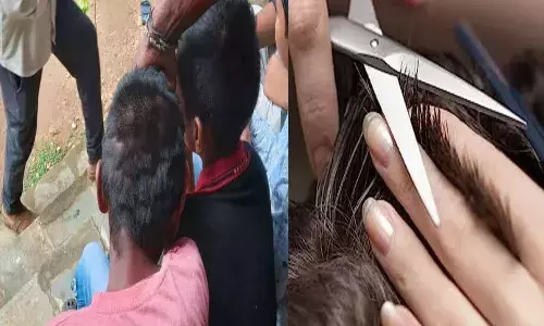khammam, teacher, hair cut,  15 students,  school, suspended ,