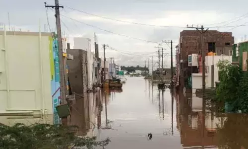 Heavy rain, Anantapur, streets submerged in water, APnews