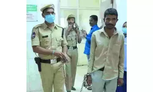 handcuffing, farmer, Sangareddy Jail Superintendent, suspended