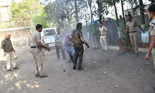 Maharashtra, man upset with wife, fire , cops