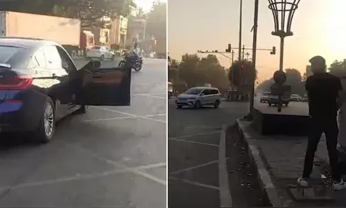 Man gets out of BMW, urinates, traffic stop, Pune