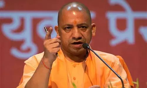 అలాంటి వాళ్లు దేశద్రోహులే : యోగి ఆదిత్యనాథ్